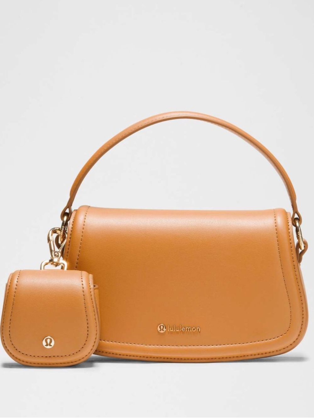 NWT Lululemon Leather Alternative Mini Bag 1.2L
Chestnut Brown/Gold